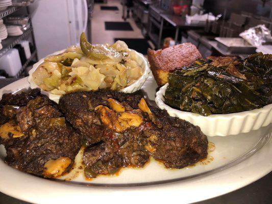 Jerk beef ribs, collard greens with smoked turkey neck and cabbage