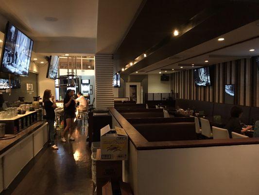 Restaurant seating, Open karaoke, darts, and bar on first floor. Second floor has private karaoke rooms.