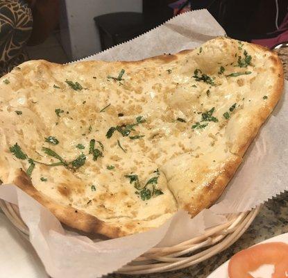 Garlic naan with salmon curry -- one of the must haves at Curry Pointe