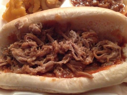 Pulled pork sandwich, Mac and cheese & baked beans. $9