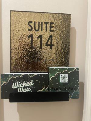 Wicked wax is located in room 114 in the Silverado Ranch Phenix Salon Suites.
