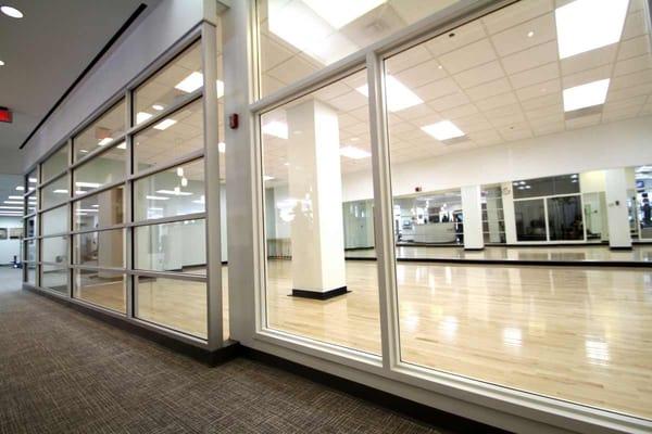 The spacious studio space is complete with bamboo flooring using Nike Grind technology (recycled sneakers)