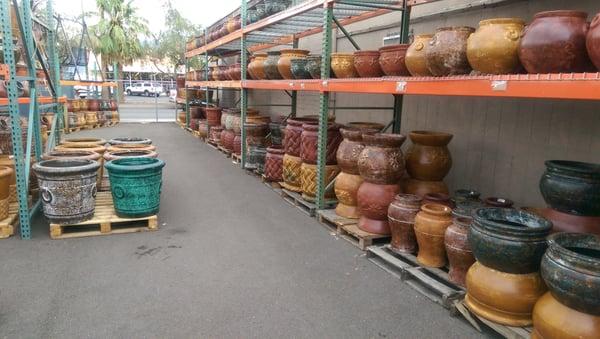Rows and Rows of planter pots big and small.