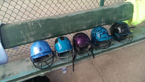 Helping the girls softball teams have customized helmets