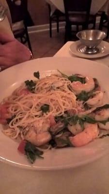 Shrimp with arugula over pasta