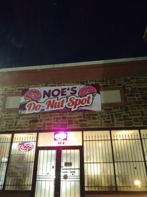 Front sign in parking lot strip center