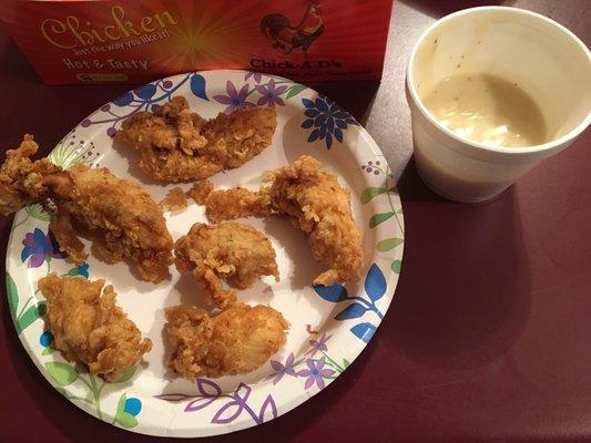These "chicken strips" that we waited forever for and the gravy that they clearly didn't have enough of. 7 piece meal.