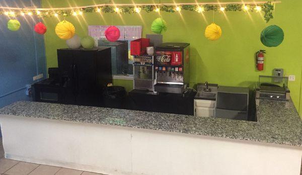 Fully equipped kitchen. We have Fridge, Stove, Microwave and a large counter to help you lay down all of your food