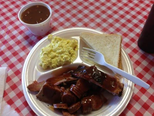 Three meat combo with sausage, rib, and brisket. Excellent flavor and very tender!