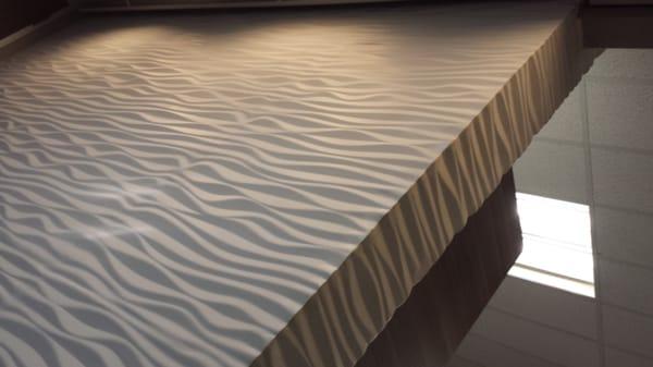 Signature Wave Wall - What a captivating and gorgeous modern facility!