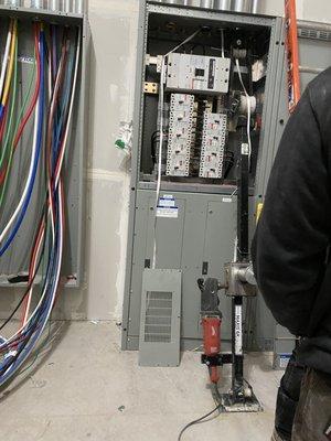 Electrical wire pulled into gear and the insulation was ripped up because they had their tugger mounted in the wrong position.