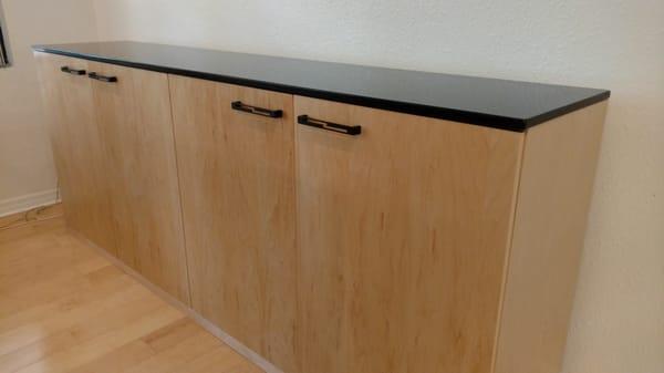 Black quartz on custom maple cabinets...