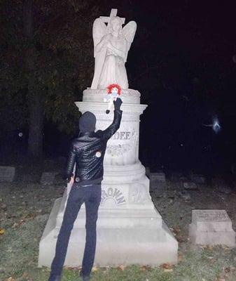 Orbs, light anomalies galore, as guest puts Raggedy Ann trigger doll on angel statue. Doll is lighting up with activity!