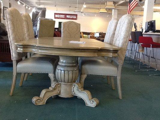Gorgeous antique white dining table and chairs. $1232