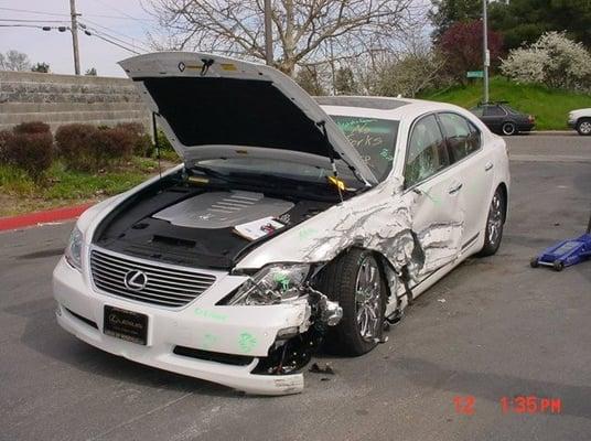 Auto body repair process. Vehicle is towed in.