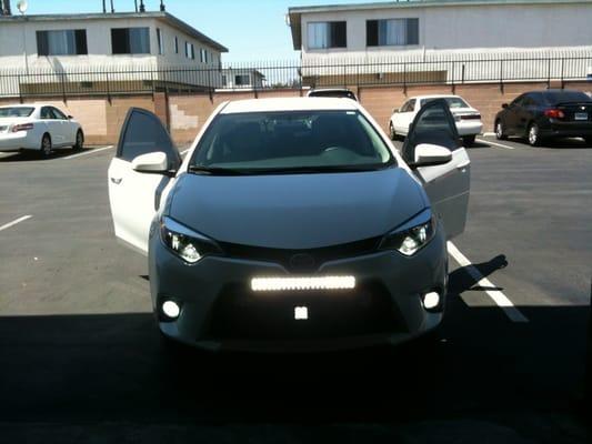 Toyota Corolla 2014 with off road-light, HID fog lights, switch back signal lights, LED headlights and high beam lights.