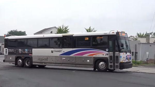 NJ Transit bus near Freehold Center at 6 minutes drive to the south of Freehold Township dentist Premier Arts Dental