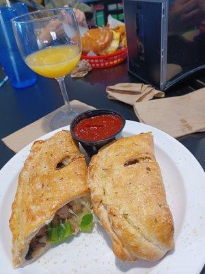 Calzone with free mimosas for the ladies on Sundays! ;)