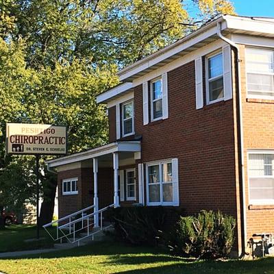 The morning sun gently greeting the hallowed red brick walls of Peshtigo Chiropractic