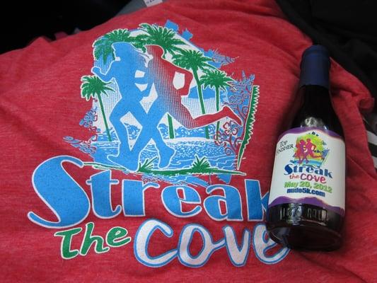2012 participant t-shirt and top 20 finisher bottle of wine. http://mealsandmiles.com/2012/05/20/streak-the-cove-5k