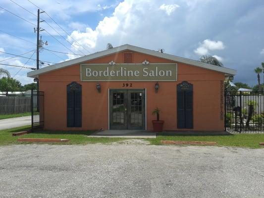 Front of business located behind a coffee shop.