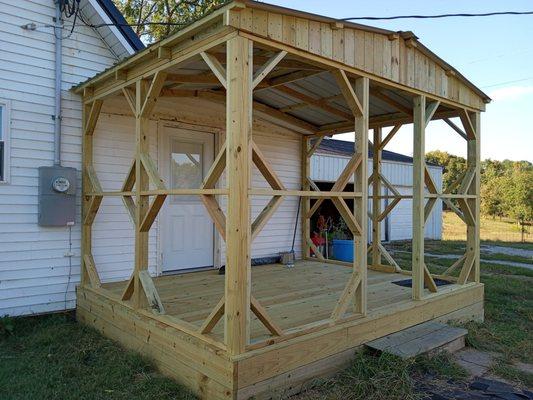 We replaced a structurally deficient porch with this new and inproved version...pre screened