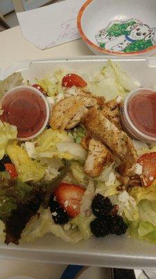 As I stated in my review. The greens on this salad are largely iceberg. The two other leaves shown are the only two.