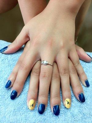 I got blue cat eye (#033) and gold chrome with a blue butterfly on the ring finger.