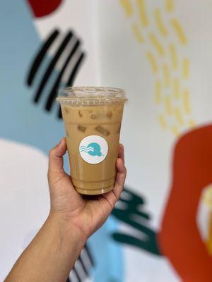 Florida Boi Latte - orange syrup with a cardamum dust. It is delicious.