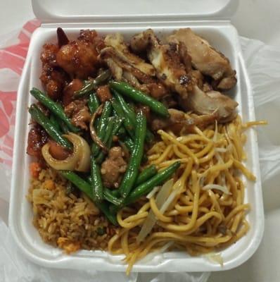 A "Closing Time Grab Bag Special": Orange chicken, sesame chicken (I *think*), green beans, fried rice, chow mein. ($4.99)