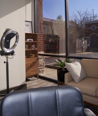 One way mirrored windows fill the studio with natural light while ensuring privacy.