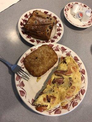 Breakfast all day, every day. An omelette, toast, and hash browns!