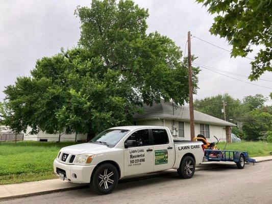 A Woman And Her Mower Lawn Care