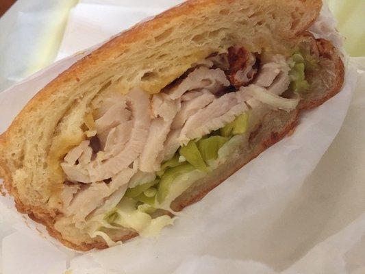 Ham and cheese croissant with peppercinni and Mendo mustard