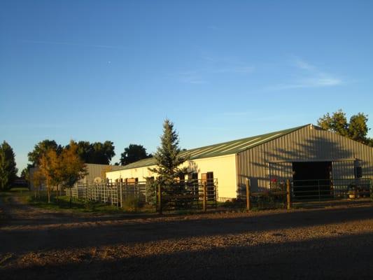 Main Barn houses 18 12x12 matted stalls with auto watering system.