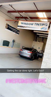 My vehicle getting the windows tinted.