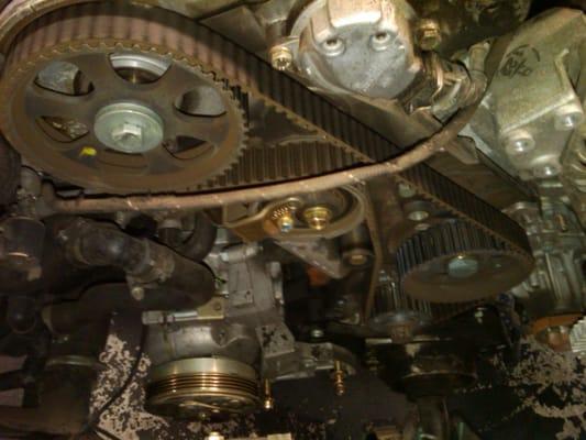 Timing belt service for a 1.8T Audi A4 engine. Water pump and thermostat should be changed at the same time.