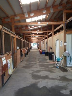 20 stall barn with indoor arena for all-weather riding.