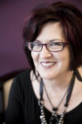 Tana Morgan, hair stylist of Hair Design by Tana located in Belle Chic Salon