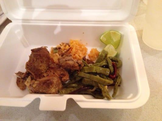 Carnitas with rice, cactus, and guacamole