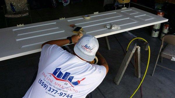 Fine Line Applications painting my interior doors and a photo of my living room. Before and after photo of the paint!!