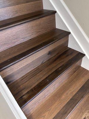 The stair noses that don't match. The company expects us to fix them