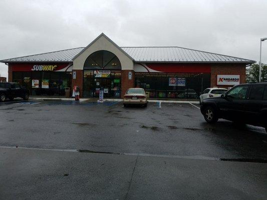 Front View of Kangaroo Express (standing at gas pump station).