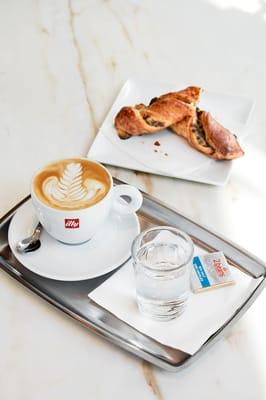 Cappuccino to stay and fresh baked Apricot Lunette