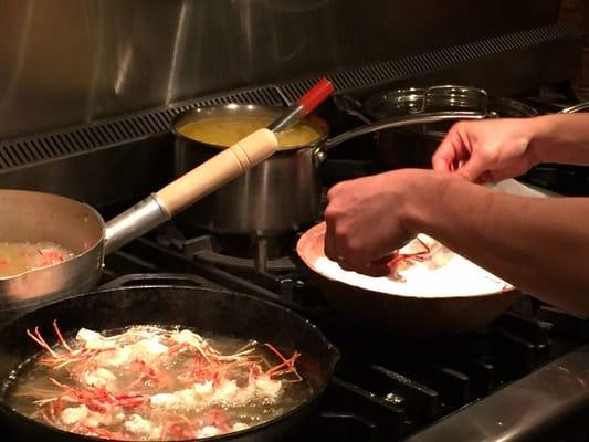 Frying up our prawn heads