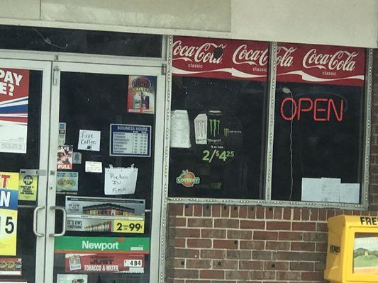 Sign says ope. Doors locked. Paper sign says "be back in 15mins" no pay at the pump. What a dump !!