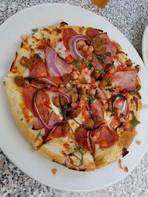 Sicilian small pie was 6 slices cut into 8 slices. Looked and tasted like a Digornos pie with some added fresh toppings for $14.79.