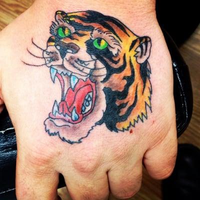 Tiger tattoo on the hand