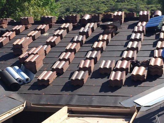 Roofing repair and recovering