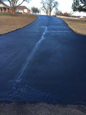 Oil base sealers and hot rubber crack fillers and patching and striping